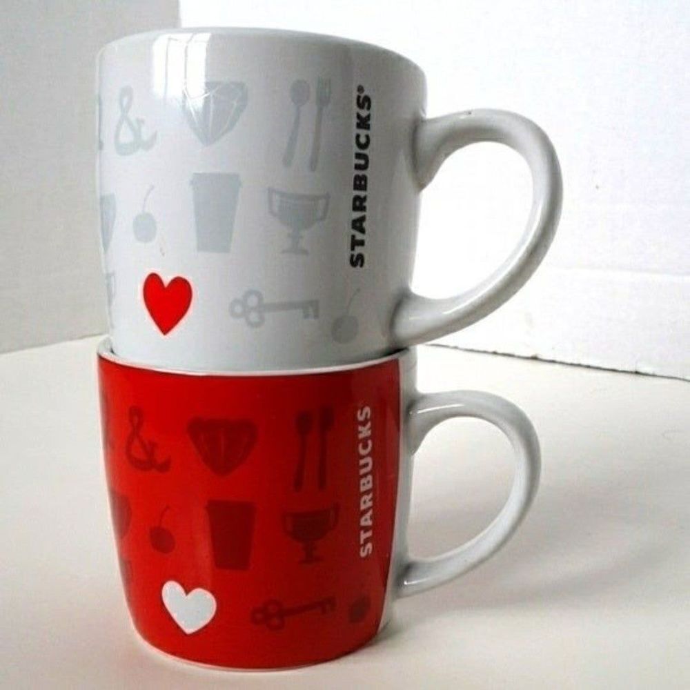 2 Starbucks coffee/tea cups
